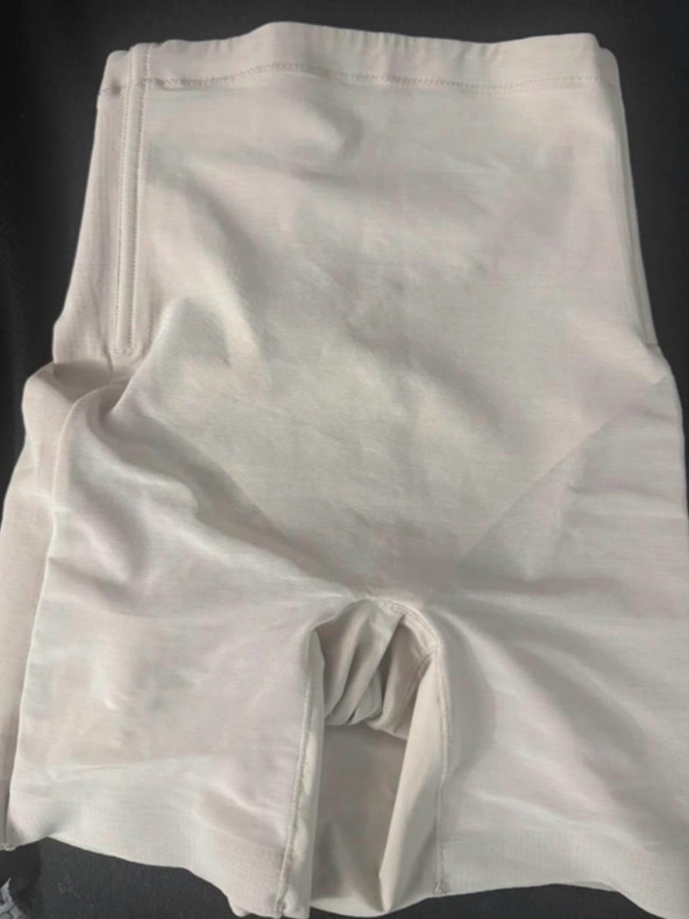 Cream colored body shaper